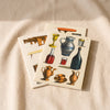John Derian Object Lessons Notebooks on a natural cotton backdrop