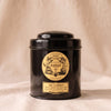 Mariage Freres The a l Opera, 100g black tea tin, on a natural cotton backdrop