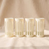 Empire Nips Glasses, Set of 4, Powder, on a natural cotton backdrop