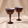 Rialto Coupe Glasses, Set of 2, Ox Blood, on a natural cotton backdrop
