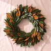 Fresh Magnolia Wreath, 28 inch, hand tied by Weston Farms, on a natural cotton backdrop