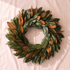 Fresh Magnolia Wreath, 36 inch, hand tied by Weston Farms, on a natural cotton backdrop