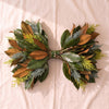 Fresh Magnolia Bow Tie in High Point Tapestry, 24 inch, with blue and yellow conifer, on a natural cotton backdrop