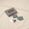 Bazaar double playing cards by Printworks on a natural cotton backdrop