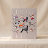 Embroidered photo album Dogs by Printworks embroidery detail on a natural cotton backdrop