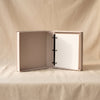Embroidered photo album Dogs by Printworks shown open on a natural cotton backdrop