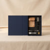 The Essentials oyster and caviar tools by Printworks shown in the open box on a natural cotton backdrop