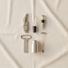 The Essentials wine tools by Printworks tools shown arranged on a natural cotton backdrop