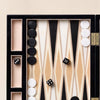 Lacquered backgammon set in black by Printworks with the board open flat