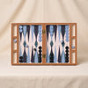 Lacquered backgammon set in blue by Printworks on a natural cotton backdrop