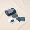 Reverra leather double playing cards by Printworks on a natural cotton backdrop