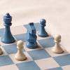 Reverra leather chess set by Printworks detail of the pieces on a natural cotton backdrop