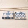 Reverra leather chess set by Printworks on a natural cotton backdrop