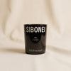 Adolescence neroli scented candle by Sibonei on a natural cotton backdrop