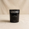 Sver mandarin scented candle by Sibonei on a natural cotton backdrop