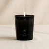 Kamea scented candle by TEKES on a natural cotton backdrop