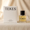 Wild Rose eau de parfum by TEKES on a natural cotton backdrop
