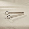 Avenir ice tongs by Zodax alternate view on a natural cotton backdrop