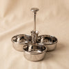 Basso condiment trio with pick holder by Zodax on a natural cotton backdrop