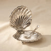 Cap Ferrat fan shell lidded bowl by Zodax alternate view on a natural cotton backdrop