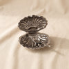 Cap Ferrat fan shell lidded bowl by Zodax second alternate view on a natural cotton backdrop