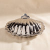 Cap Ferrat fan shell lidded bowl by Zodax third alternate view on a natural cotton backdrop