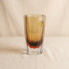 Corvatsch tonal vase in amber and smoke 8.25 inch by Zodax on a natural cotton backdrop