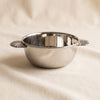 Eden Roc condiment bowl in polished nickel by Zodax on a natural cotton backdrop