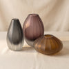 Milano cut and frosted vase in amber by Zodax alternate view on a natural cotton backdrop