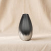 Milano cut and frosted vase in smoke by Zodax on a natural cotton backdrop