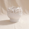 Shellstone handmade ceramic vase by Zodax on a natural cotton backdrop