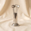 Spiga cocktail picks set with stand by Zodax on a natural cotton backdrop